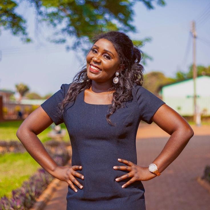 Alex Rivera, Lead Design Curator at MapleStageWorks, reviewing corporate floral arrangements